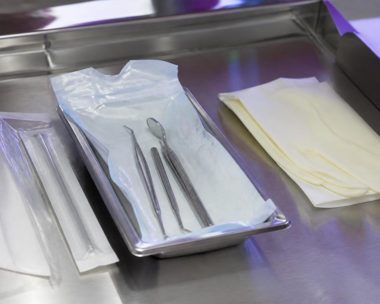 Sterile single-use instruments prepared on a steel tray